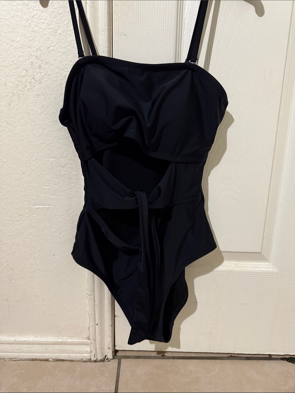 Sleek Black Cutout One-Piece Swimsuit with Front Tie